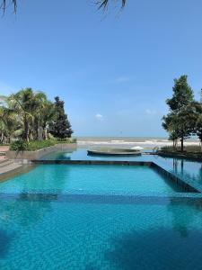 Foto da galeria de Timur bay groundfloor pool & seaview em Kuantan