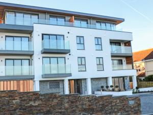 an image of a white building at Little Fistral in Newquay