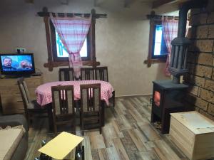 TV a/nebo společenská místnost v ubytování Vila Balerina + 7 fotografií