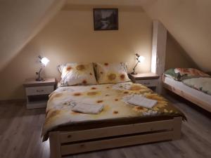 מיטה או מיטות בחדר ב-Apartmány Matilda