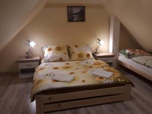 Posteľ alebo postele v izbe v ubytovaní Apartmány Matilda