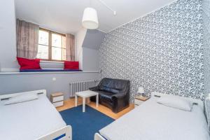 Posteľ alebo postele v izbe v ubytovaní Hostel Universus