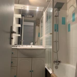 a bathroom with a sink and a shower at Boost Your Immo Six Fours Les Plages Le Lubéron 245 in Six-Fours-les-Plages