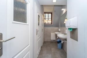 Kúpeľňa v ubytovaní Hostel Universus