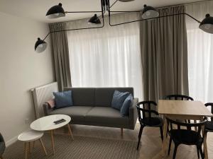 Posedenie v ubytovaní ONE Apartamenty Gąsiorowskich 4