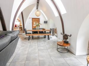 A seating area at Penthouse St Mary's Church