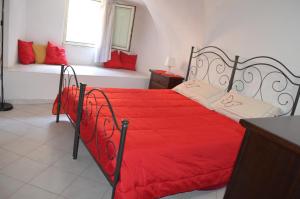 Postel nebo postele na pokoji v ubytování Santa Maria Le Grazie House