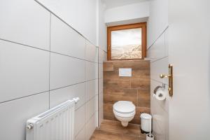 Afbeelding uit fotogalerij van Herzerl-Chalet Appartements in Flachau