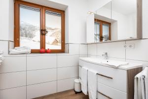 Afbeelding uit fotogalerij van Herzerl-Chalet Appartements in Flachau