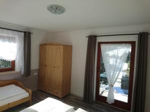 A bed or beds in a room at Berliner Ecke