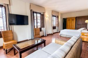 TV a/nebo společenská místnost v ubytování Hotel Plaza Nueva