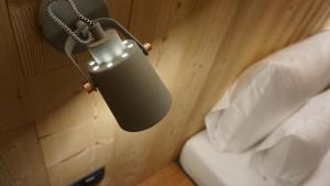 A bed or beds in a room at ARLBERGhome Komfort-Apartments & Privat-Sauna
