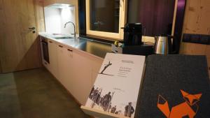 A kitchen or kitchenette at ARLBERGhome Komfort-Apartments & Privat-Sauna