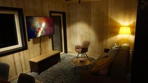 A seating area at ARLBERGhome Komfort-Apartments & Privat-Sauna