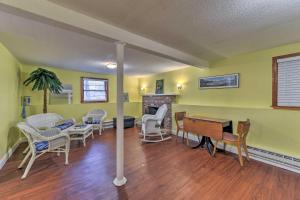 a living room with a table and chairs at Pond Access and Private Dock East Wareham Home in East Wareham