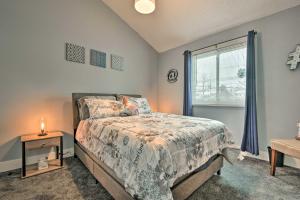a bedroom with a bed and a window at Near Mt Airy Casino Mount Pocono Condo with Balcony in Mount Pocono
