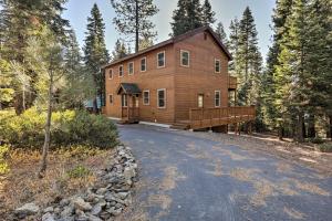 a large wooden house in the middle of a road at Carnelian Bay Home with Hot Tub Near Tahoe Skiing in Carnelian Bay