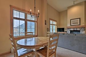 a dining room with a table and a couch at Keystone Ski Condo with Mtn View - Walk to Gondola! in Keystone