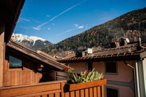 a balcony with a view of a mountain at Residenza Marconi in Pinzolo