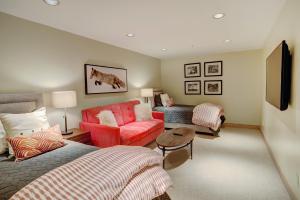 a living room with a bed and a couch at Pines TH01 in Beaver Creek