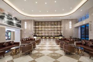Posezení v ubytování Ramada Plaza by Wyndham Enshi