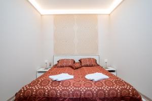 Posteľ alebo postele v izbe v ubytovaní Modern, Quiet & Cozy Apartment in the middle of Downtown near Danube at Fashion street + 37 fotografií
