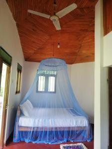 Postel nebo postele na pokoji v ubytování Calm Garden Cabanas