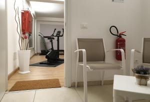 Posilňovňa alebo fitness centrum v ubytovaní Travini Hotel Residence