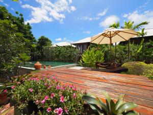 Aed väljaspool majutusasutust BaanSuk Sukhothai Resort