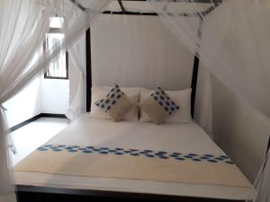 Postel nebo postele na pokoji v ubytování Apna Homestay Apartments