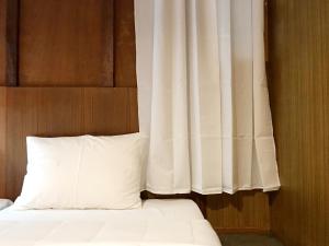 Ein Bett oder Betten in einem Zimmer der Unterkunft Boundary Hostel and Cafe