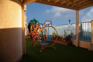 Dječje igralište u objektu Seven Garden Alhada Suites