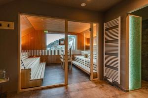 Letto o letti in una camera di Stadtvilla Schladming Boutiquehotel