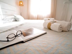 Hostal Sa Posada Set Cales客房内的一张或多张床位