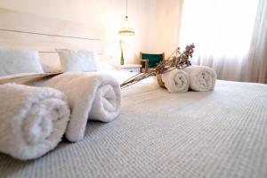 Hostal Sa Posada Set Cales客房内的一张或多张床位
