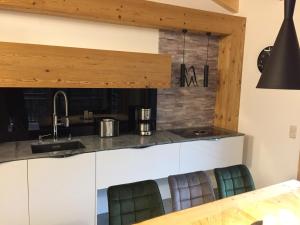 Kuchyň nebo kuchyňský kout v ubytování Chalet Glemmtal - Haus Bergblick