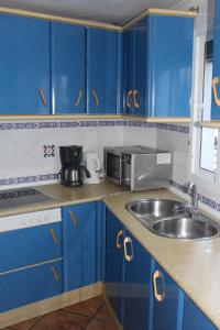 A kitchen or kitchenette at Casa Sonrisa