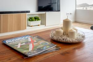 Televízia a/alebo spoločenská miestnosť v ubytovaní Flatguest Ansite + Deluxe + Panoramic Views + Fast WiFi
