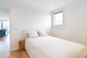 Posteľ alebo postele v izbe v ubytovaní Flatguest Ansite + Deluxe + Panoramic Views + Fast WiFi