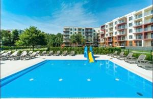Bazén v ubytovaní FARO Apartamenty Polanki Park z basenami alebo v jeho blízkosti + 26 fotografií