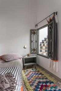 Letto o letti in una camera di Riad Dar-tus