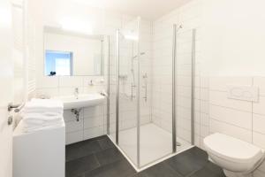 Een badkamer bij Altstadt Apartments Verden