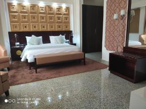 Postel nebo postele na pokoji v ubytování Conference Hotel , Abeokuta