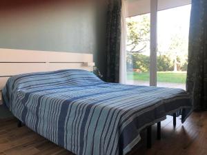 Postel nebo postele na pokoji v ubytování GioiaSulGarda