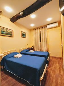 Кровать или кровати в номере Casa di Stella