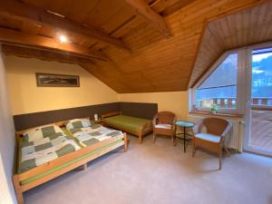 Postel nebo postele na pokoji v ubytování Apartmany U Kamenky + 46 fotografií