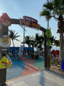 a park with a play park with a playground at Jomtien Beach Hostel & Guesthouse in Jomtien Beach