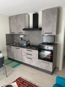 A kitchen or kitchenette at 8 di cuori