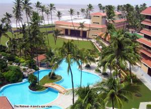 an aerial view of a resort with a swimming pool at The Retreat Hotel & Convention Centre in Mumbai