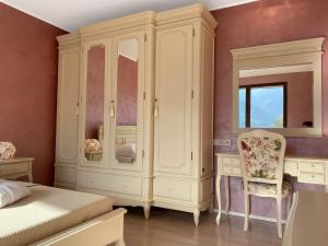 Posteľ alebo postele v izbe v ubytovaní VILLA COLLINA VERDE